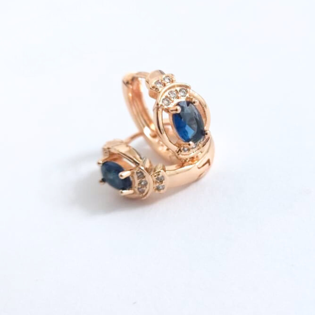 Aretes cerrados con cristal azul