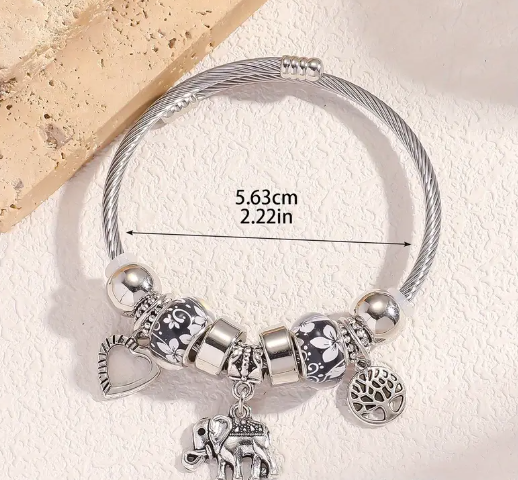 Pulsera brazalete con charms negro y elefante