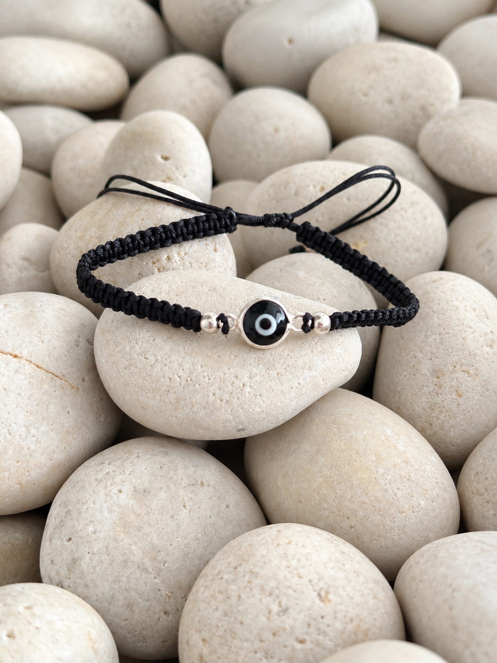 Pulsera tejida de ojo turco negro
