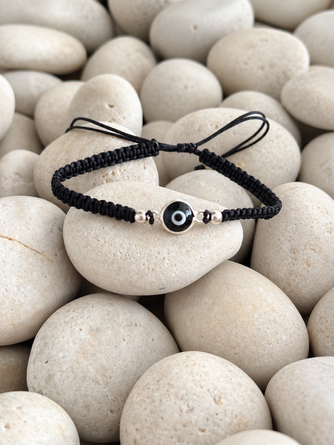 Pulsera tejida de ojo turco negro