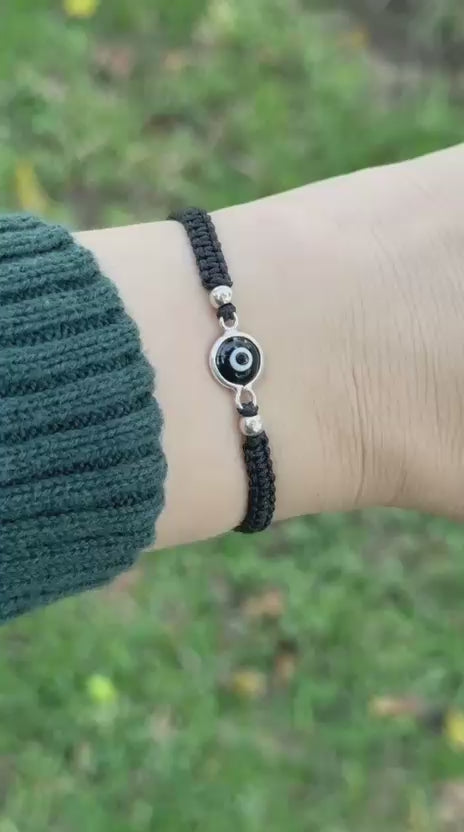 Pulsera tejida de ojo turco negro